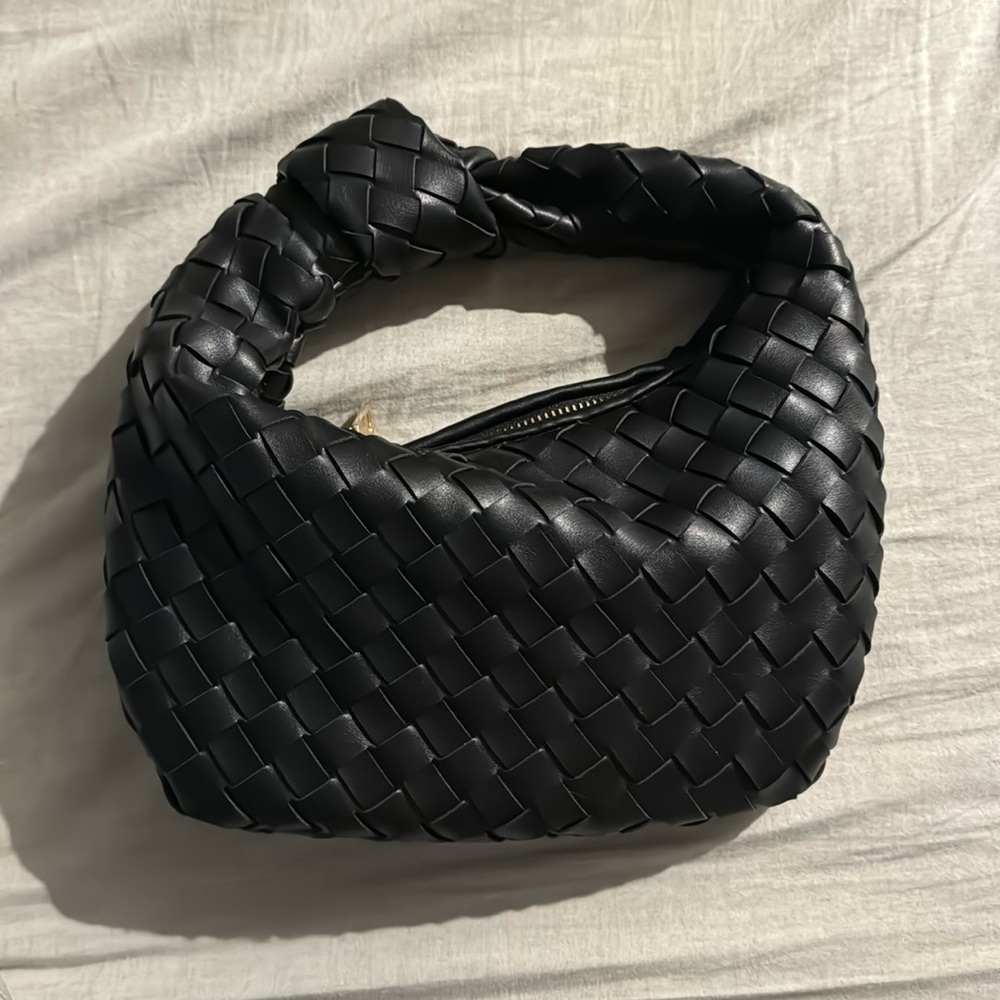 Tracy woven knot clutch